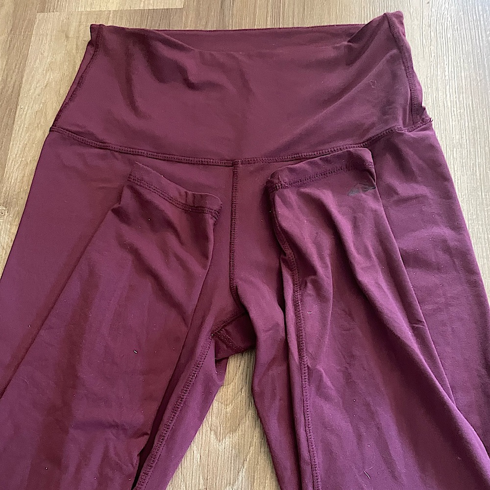 Buttery smooth maroon leggings.